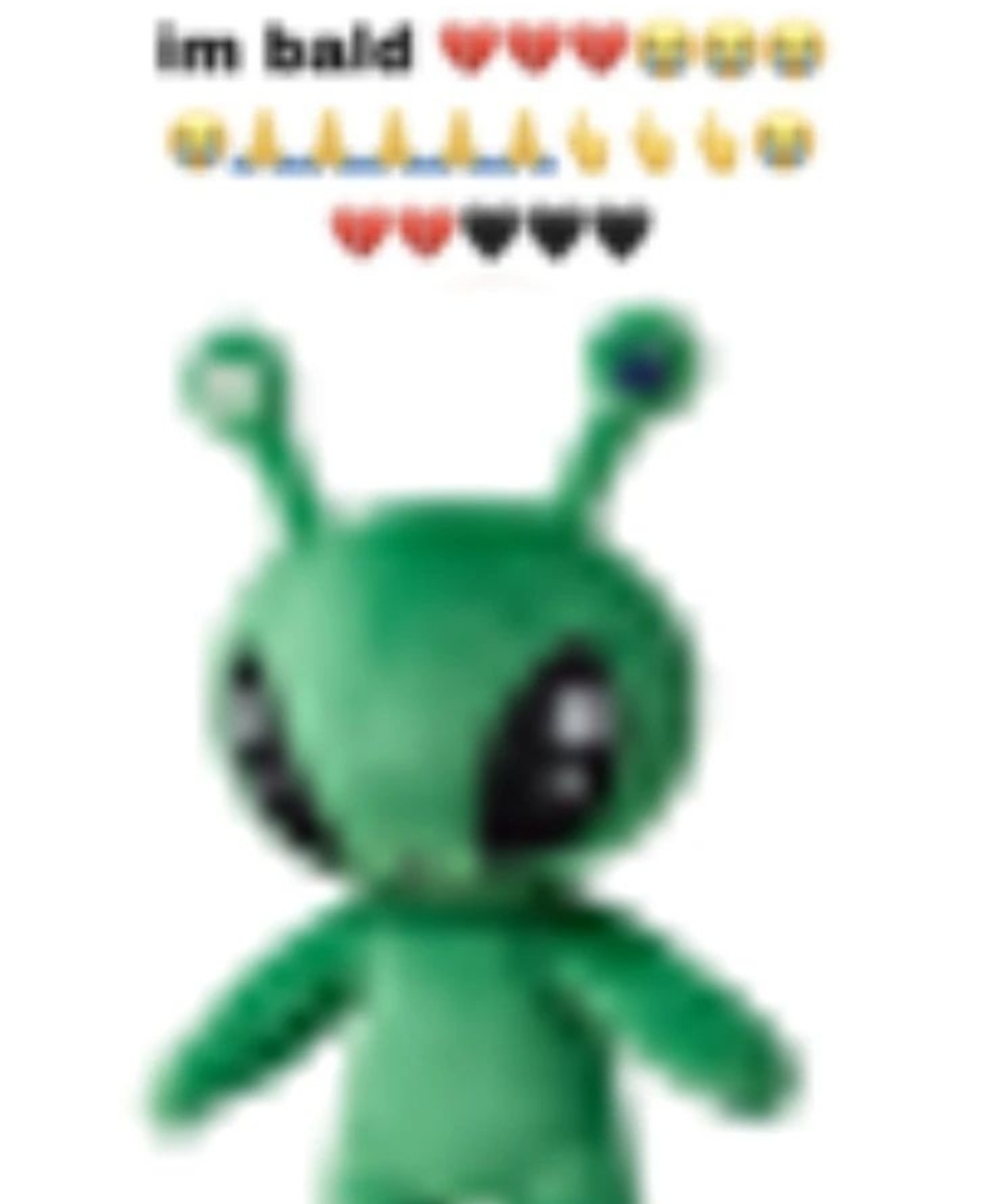 low quality image of an alien ikea plush with the text 'IM BALD!!!!'